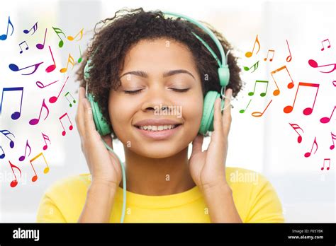 Happy Woman With Headphones Listening To Music Stock Photo Alamy