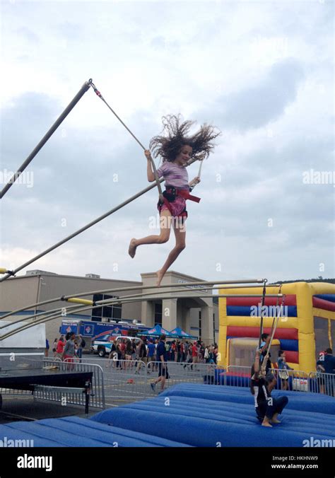 Children Bungee Jumping Stock Photo Alamy