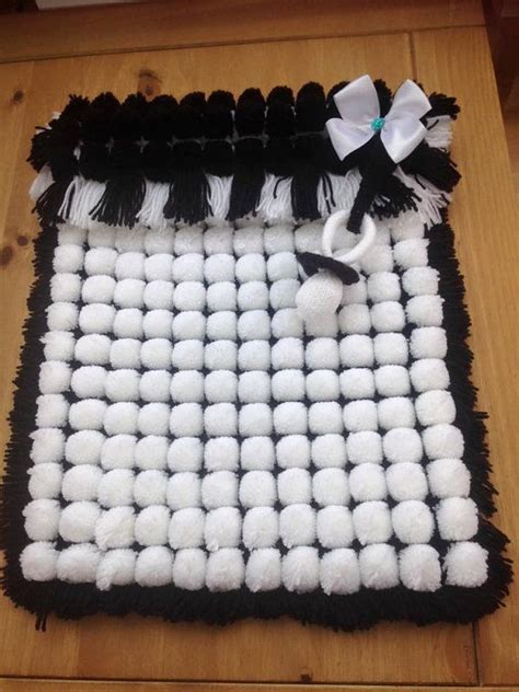 Black And White Pram Blanket Etsy Ireland Pom Pom Crafts Pram Blanket Pom Pom Rug