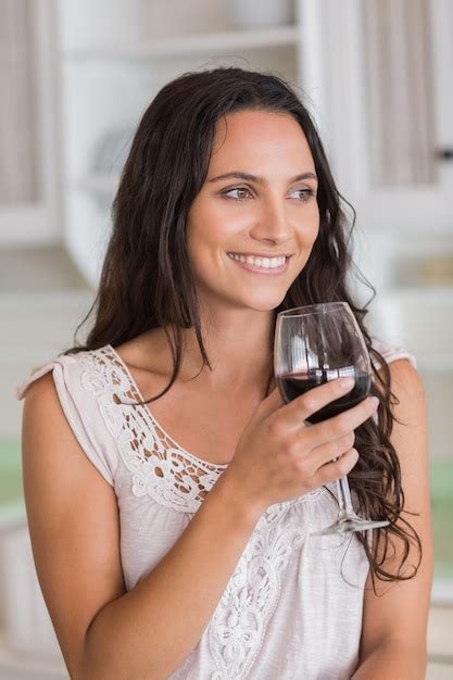 Premium Photo Pretty Brunette Having A Glass Of Wine