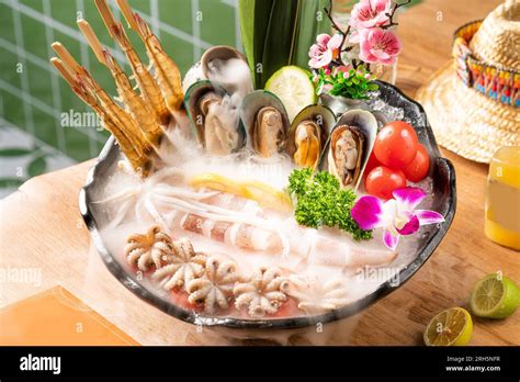 Seafood With Shrimp Oysters Abalone Clams Scallops On Plate Ready For Hot Potseafood