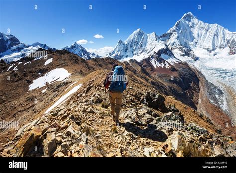 Hiking scene in Cordillera mountains, Peru Stock Photo - Alamy