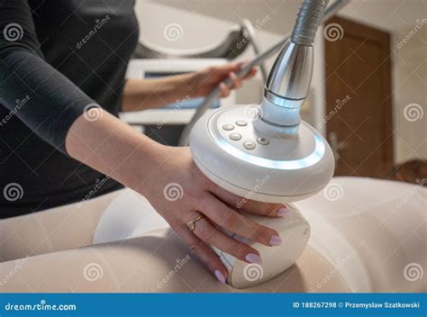 Anti Cellulite Massage In Spa Clinic With Lipo Massage Apparatus And