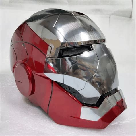 An Iron Man Helmet Sitting On Top Of A Table