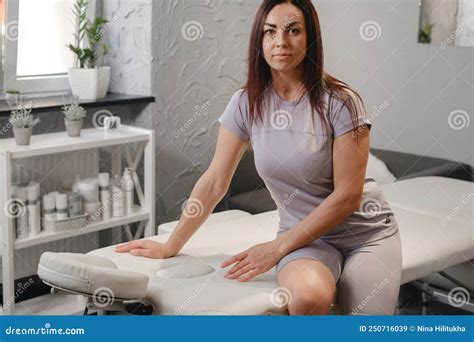 Therapist Preparing For Massage In Medical Office Stock Image Image