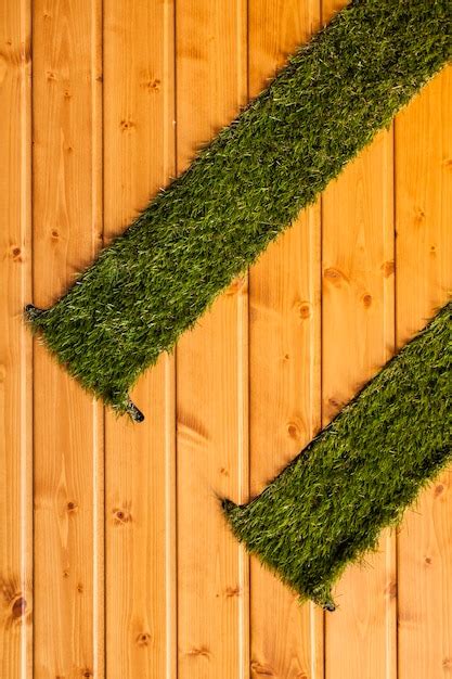 Free Photo Wooden Background With Artificial Grass