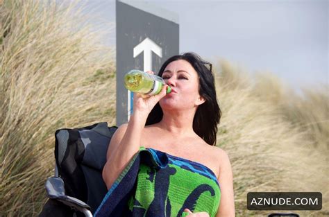 Lisa Appleton Nude Outdoors On The Beach Eating A Banana Aznude