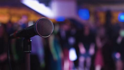 Microphone On The Stand Is Standing On The Stage Close Up Microphone On The Background Of The