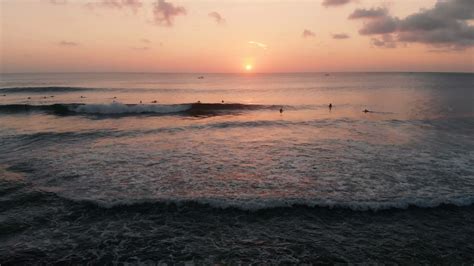 K Drone Footage Golden Sunset Indian Ocean Bali Uluwatu Beach Stock