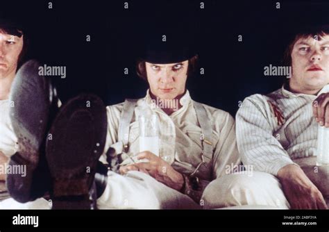 A CLOCKWORK ORANGE, from left, Warren Clarke, Malcolm McDowell, James Marcus, 1971 Stock Photo ...