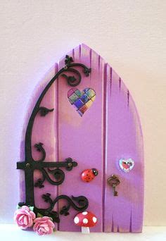 A Lilac Fairy Door Going To A New Home In