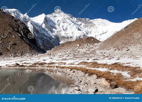 View Of Cho Oyu Mirroring In Lake Cho Oyu Base Camp Stock Photo