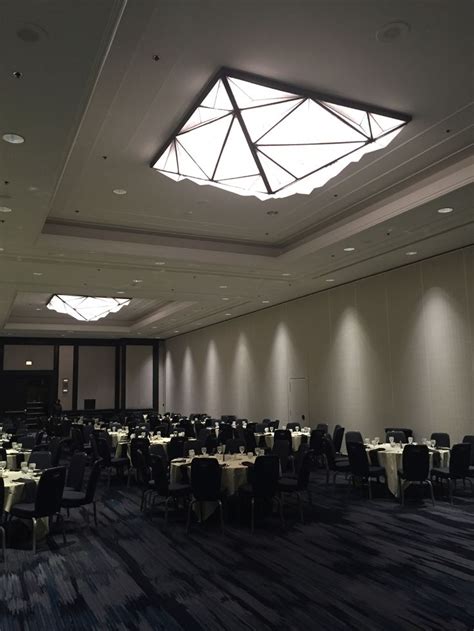 Elegant Ballroom Lighting With Pleated Fabric Shades