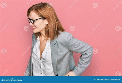 Young Caucasian Woman Wearing Business Style And Glasses Suffering Of