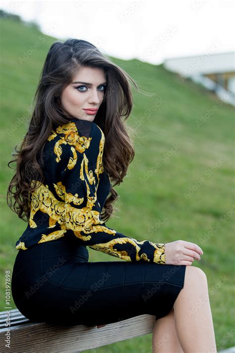 Beautiful Brunette Girl In Dress Sitting In The Fresh Air Stylish Model With Long Hair Stock