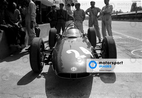 The BRM P48 57 Of Graham Hill GBR Waits For Action In The Pits