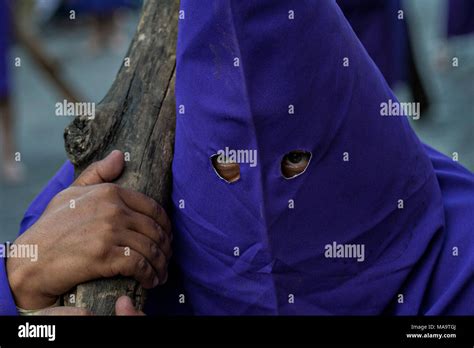 Queretaro Mexico 31 Mar 2018 A Hooded Penitent Carries A Heavy