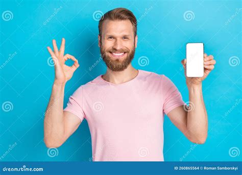 Photo Of Sweet Confident Man Wear Pink T Shirt Showing Okey Gesture