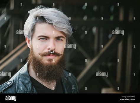 Bearded Hipster With Nose Ring In Leather Jacket Stock Photo Alamy