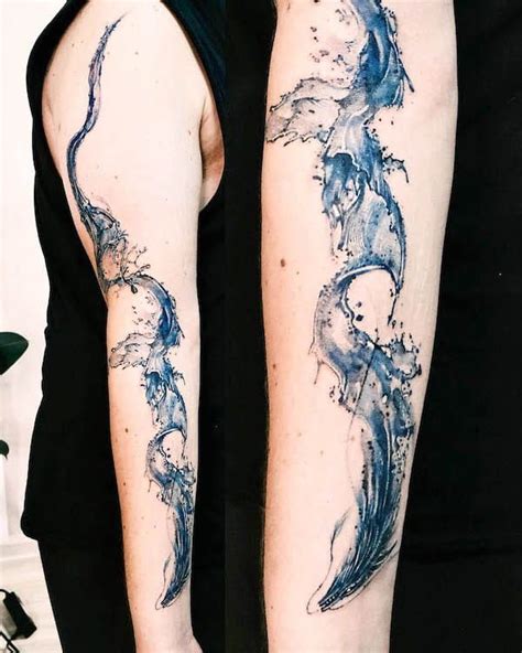 56 Elegant Water Tattoos With Meaning Our Mindful Life Dolphins