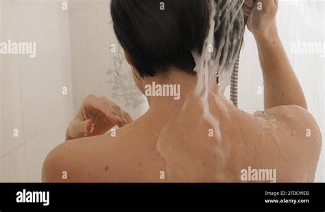 Naked Woman Takes A Shower Woman Washes Her Short Hair With Shampoo Slow Stock Video Footage
