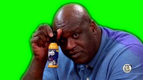 Green Screen Shaq Tries To Not Make A Face While Eating Spicy Wings