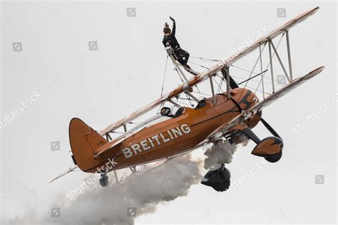 Britisch Wingwalker On Biplane Team Breitling Editorial Stock Photo