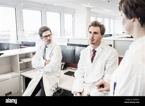 Two Men Standing With Arms Crossed Hi Res Stock Photography And Images