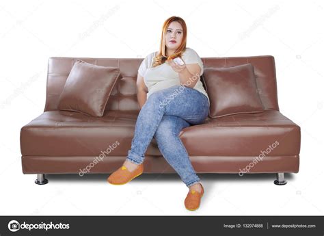 Dicke Frau Schaut Fernsehen Auf Dem Sofa Stockfoto © Realinemedia