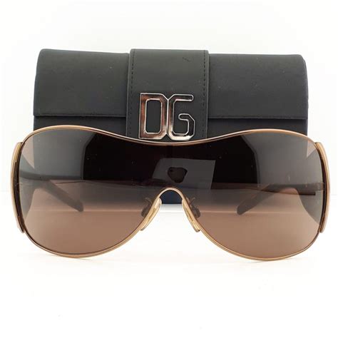 Dolce Gabbana Shield Bronze Frame And Tortoise Shell Temples With