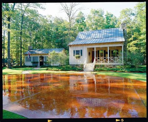 An Image Of A House That Is In The Middle Of A Pond With Water On It