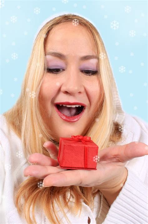 Blonde Woman Shows Present Stock Photo Image Of Surprised