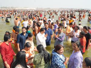 Odisha Governor Hari Babu Kambhampati Takes Holy Dip At Triveni Sangam