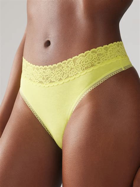 Cotton Essentials Lace Trim Mid Rise Thong Panty In Yellow Savage X Fenty