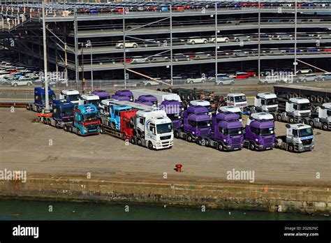 Lorries Waiting To Be Loaded On The Dockside Hi Res Stock Photography