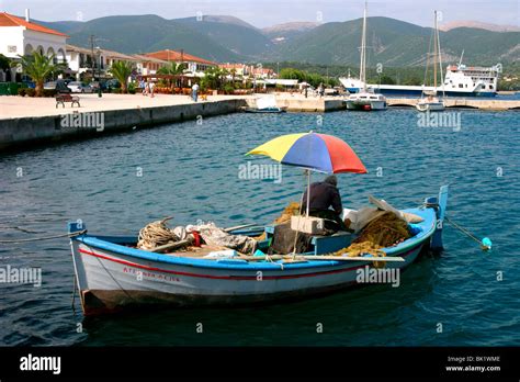 Small Fishing Boat In The Harbour Sami Kefalonia Greece Stock Photo