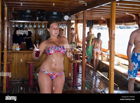 Attractive Beautiful Dutch Girl In Swimsuit Bikini Dancing On Board Of