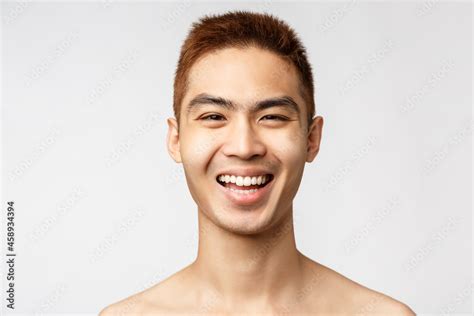 Beauty Skincare And Men Health Concept Headshot Of Enthusiastic Handsome Asian Man With Naked