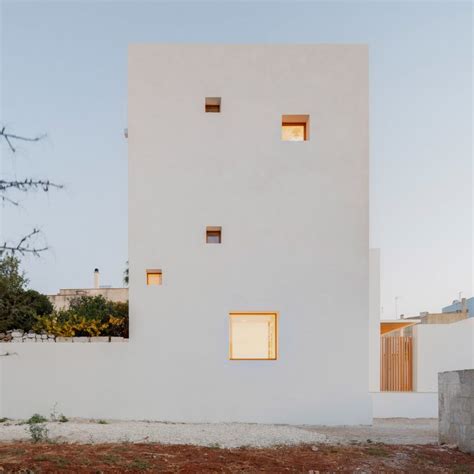 Architect designs own house with white tower in Puglia - architecture and design