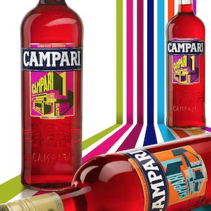 two bottles of campari are sitting next to each other on colorful ...