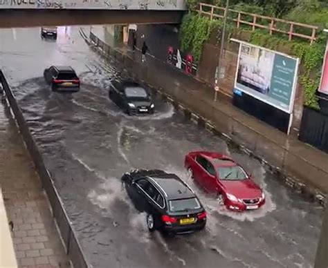 London Streets Submerged As Thunderstorms Spark Flood Warnings Across Uk