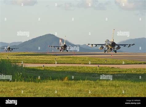 U S Air Force F 16 Fighting Falcons Assigned To The 8th Fighter Wing Taxi Down The Runway In