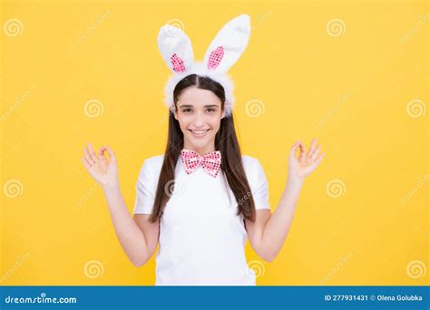 Happy Easter Portrait Of Young Smiling Woman With Bunny Ears Isolated