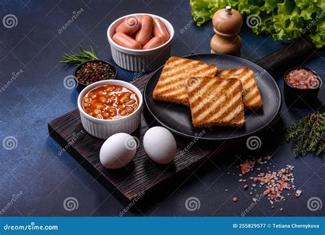 Traditional English Breakfast With Eggs Toast Sausages Beans Spices