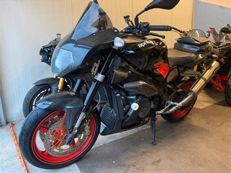 Aprilia RSV Tuono 2005 En RSV Mille R 2000 Carbon Akrapovic