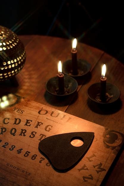 Free Photo Ouija Board And Candles Arrangement High Angle