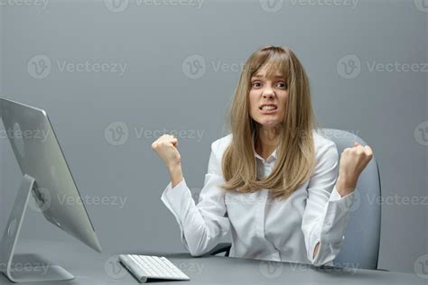 Irritated Blonde Businesswoman Made A Critical Mistake Using Desktop
