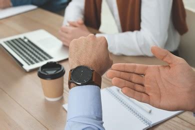 Teacher Scolding Pupil For Being Late In Classroom Focus On Alarm