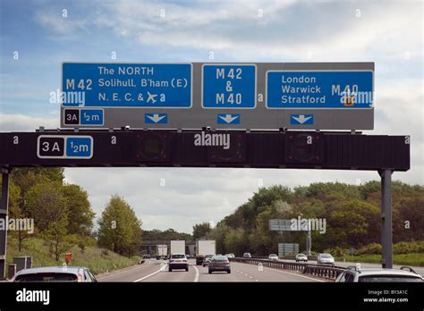 Overhead gantry Motorway signs above the M42 before junction 3A for ...