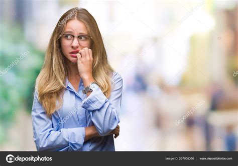 Young Beautiful Blonde Business Woman Wearing Glasses Isolated